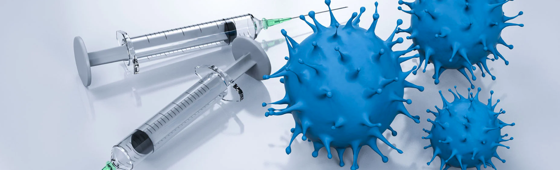 A photo of syringes and Coronavirus molecules